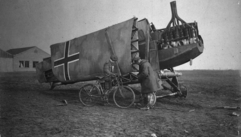 285_Two Canadians interested in a German tin plane, the wings of which are also made of metal. November, 1918.